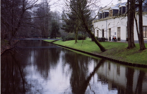A moat to the left of the castle
